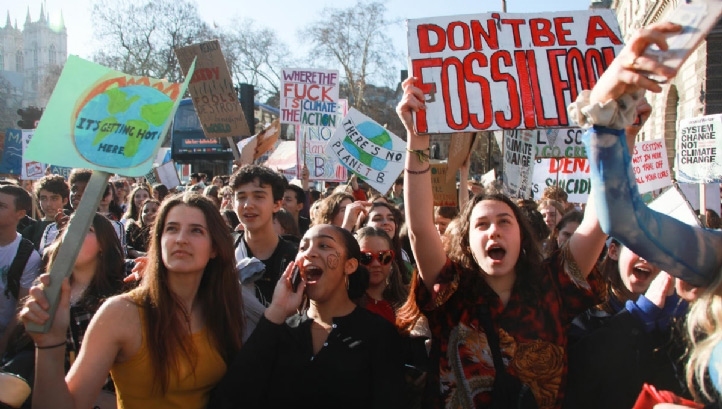 Around 1.4 million people took part in March's global strike, with calls to action now directed at businesses as well as policymakers. Image: Greenpeace